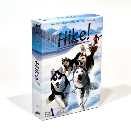 Ein Kartenspiel mit rennenden Huskys auf der Verpackung